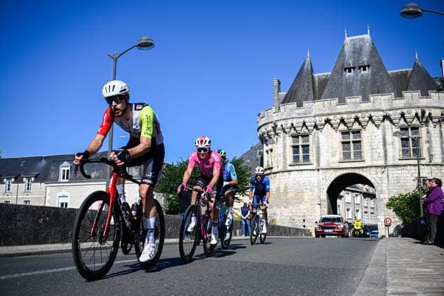 Paris Tours 2025 Cycling Race TOURS, FRANCE - OCTOBER 12 : Rutsch Jonas (GER) of Intermarche - Wanty in the escape pack, Molly Kenny of Van Rysel Roubaix during the 119th edition of Paris Tours an UCI ProSeries 1.Pro one day cycling road race for Men Elite of 211.6 km with start in Chartres and finish in Tours on October 12, 2025 in Tours, France, 12 10 2025 ( Motordriver Guy De Vuyst - Tours France  Copyright: xPeterxDexVoechtx