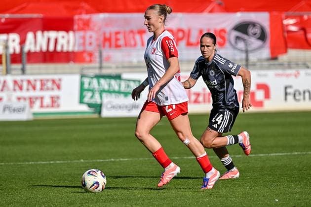Sophie Nachtigall SC Freiburg Women, 27 on the ball in front of Geraldine Reuteler Eintracht Frankfurt, 14 GER, SC Freiburg Eintracht Frankfurt, Women Football, Google Pixel Women Bundesliga, Matchday 6, Season 2025 2026, 12 10 2025 DFB REGULATIONS PROHIBIT ANY USE OF PHOTOGRAPHS AS IMAGE SEQUENCES AND OR QUASI VIDEO GER, SC Freiburg Eintracht Frankfurt, Women Football, Google Pixel Women Bundesliga, Matchday 6, Season 2025 2026, 12 10 2025 Freiburg Copyright: xEibner-Pressefoto ThomasxHessx EP_THS