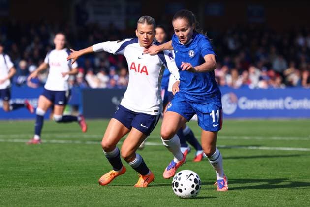 Kington Upon Thames, England, 12th October 2025. Charlotte Grant of Tottenham Hotspur and Guro Reiten of Chelsea challenge for the ball during the Chelsea Women vs Tottenham Women Barclays Women s Super League match at Kingsmeadow, Kington Upon Thames. Picture credit should read: Paul Terry Sportimage EDITORIAL USE ONLY. No use with unauthorised audio, video, data, fixture lists, club league logos or live services. Online in-match use limited to 120 images, no video emulation. No use in betting, games or single club league player publications. SPI_027_PT_Chelsea_W_Spurs_W SPI-4209-0026
