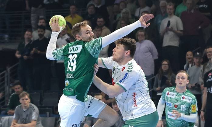 Mathias Gidsel on the ball, Philipp Vorlicek duel Match scene Action Sport Handball HBL Bundesliga Men 8 Matchday Season 2025 2026 12 10 2025 Füchse Berlin vs TSV GWD Minden