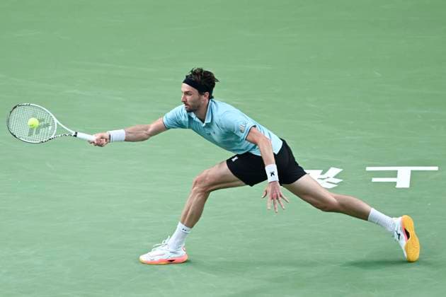 (251012) -- SHANGHAI, Oct. 12, 2025 -- Arthur Rinderknech hits a return during the men s singles final between Arthur Rinderknech of France and Valentin Vacherot of Monaco at the ATP, Tennis Herren World Tour Shanghai Masters tennis tournament in Shanghai, east China, Oct. 12, 2025. ) (SP)CHINA-SHANGHAI-TENNIS-ATP TOUR-SHANGHAI MASTERS-MEN S SINGLES (CN) ChenxHaoming 