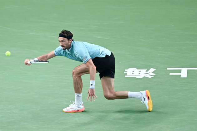 (251012) -- SHANGHAI, Oct. 12, 2025 -- Arthur Rinderknech hits a return during the men s singles final between Arthur Rinderknech of France and Valentin Vacherot of Monaco at the ATP, Tennis Herren World Tour Shanghai Masters tennis tournament in Shanghai, east China, Oct. 12, 2025. ) (SP)CHINA-SHANGHAI-TENNIS-ATP TOUR-SHANGHAI MASTERS-MEN S SINGLES (CN) ChenxHaoming 