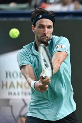 (251012) -- SHANGHAI, Oct. 12, 2025 -- Arthur Rinderknech hits a return during the men s singles final between Arthur Rinderknech of France and Valentin Vacherot of Monaco at the ATP, Tennis Herren World Tour Shanghai Masters tennis tournament in Shanghai, east China, Oct. 12, 2025. ) (SP)CHINA-SHANGHAI-TENNIS-ATP TOUR-SHANGHAI MASTERS-MEN S SINGLES (CN) ChenxHaoming 