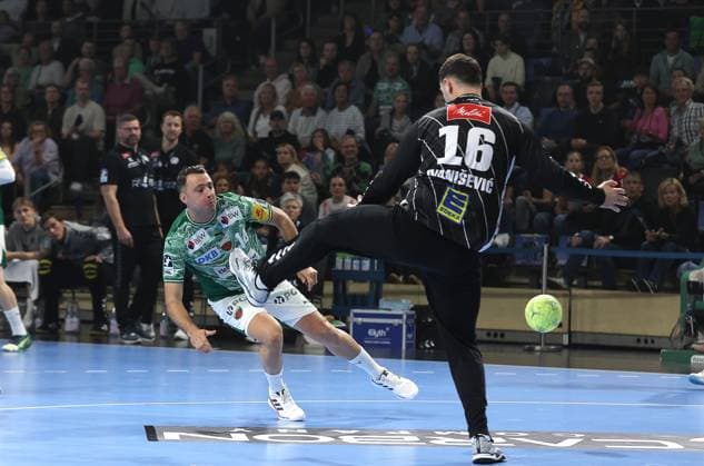 Aitor Arino scores a goal against goalkeeper Tibor Ivanisevic duel Match scene Action Sport Handball HBL Bundesliga Men 8 Matchday Season 2025 2026 12 10 2025 Füchse Berlin vs TSV GWD Minden