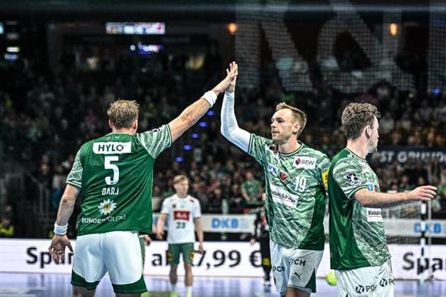 12 10 2025, xlakx, Handball Daikin HBL, Fuechse Berlin GWD Minden v l Max Darj Fuechse Berlin , Mathias Gidsel Fuechse Berlin , Hakun West Av Teigum Fuechse Berlin Jubel, Torjubel, jubelt über das Tor, celebrate the goal, celebration Berlin Daniel Lakomski