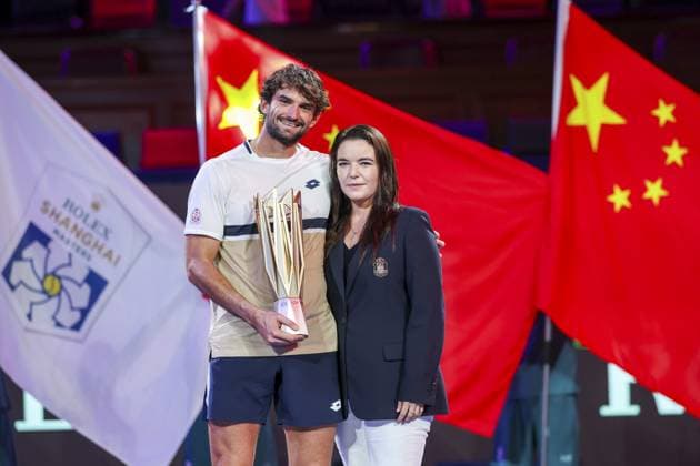SHANGHAI, CHINA - OCTOBER 12: Valentin Vacherot of Monaco poses for a photo with Melanie-Antoinette de Massy, president of the Monegasque Tennis Federation during the award ceremony after men s singles final match against Arthur Rinderknech of France on day 14 of the 2025 Shanghai Rolex Masters at Qi Zhong Tennis Center on October 12, 2025 in Shanghai, China. (Photo by Qian Jun) Copyright: xQianxJunx Sportspressphoto_SPR41527