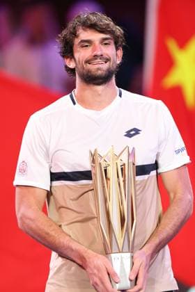 (251012) -- SHANGHAI, Oct. 12, 2025 -- Valentin Vacherot reacts with the trophy during the awarding ceremony after the men s singles final between Arthur Rinderknech of France and Valentin Vacherot of Monaco at the ATP, Tennis Herren World Tour Shanghai Masters tennis tournament in Shanghai, east China, Oct. 12, 2025. ) (SP)CHINA-SHANGHAI-TENNIS-ATP TOUR-SHANGHAI MASTERS-MEN S SINGLES (CN) DingxTing 
