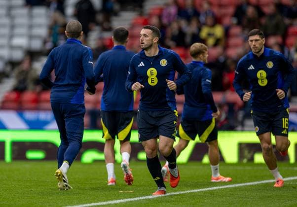 12th October 2025; Hampden Park, Glasgow, Scotland; World Cup Qualifiers International Football, Scotland versus Belarus; John McGinn of Scotland leads the warm up  VagelisxGeorgariou
