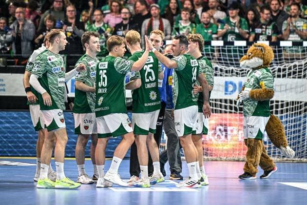 12 10 2025, xlakx, Handball Daikin HBL, Fuechse Berlin GWD Minden f l Mathias Gidsel Fuechse Berlin Hakun West Av Teigum Fuechse Berlin Max Guenther Fuechse Berlin Matthes Langhoff Fuechse Berlin Arino Aitor Fuechse Berlin Cheering about the victory, cheering after the end of the game Berlin Daniel Lakomski