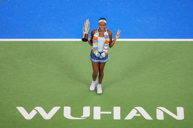 WUHAN, CHINA - OCTOBER 12: Champion Coco Gauff of the United States celebrates with the trophy at the award ceremony after winning the Women s Singles Final match against Jessica Pegula of the United States on day 9 of 2025 Wuhan Open at Optics Valley International Tennis Center on October 12, 2025 in Wuhan, Hubei Province of China.  Copyright: xVCGx 111596765220