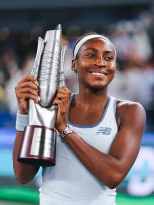 WUHAN, CHINA - OCTOBER 12: Champion Coco Gauff of the United States celebrates with the trophy at the award ceremony after winning the Women s Singles Final match against Jessica Pegula of the United States on day 9 of 2025 Wuhan Open at Optics Valley International Tennis Center on October 12, 2025 in Wuhan, Hubei Province of China.  Copyright: xVCGx 111596765153