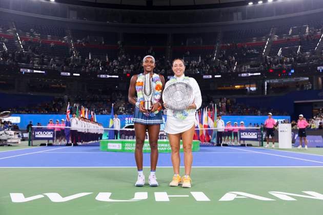 WUHAN, CHINA - OCTOBER 12: Champion Coco Gauff of the United States and runner-up Jessica Pegula of the United States pose with the trophies at the award ceremony following the Women s Singles Final match on day 9 of 2025 Wuhan Open at Optics Valley International Tennis Center on October 12, 2025 in Wuhan, Hubei Province of China.  Copyright: xVCGx 111596765203