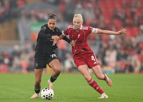 Liverpool, England, 12th October 2025. Iman Beney of Manchester City and Grace Fisk of Liverpool Women battle for the ball during the Liverpool FC Women vs Manchester City Women Barclays Women s Super League match at Anfield, Liverpool. Picture credit should read: Cody Froggatt Sportimage EDITORIAL USE ONLY. No use with unauthorised audio, video, data, fixture lists, club league logos or live services. Online in-match use limited to 120 images, no video emulation. No use in betting, games or single club league player publications. SPI_034_CF_LIVERPOOL_FC_WOMEN_V_MANCHESTER_CITY_WOMEN SPI-4213-0034
