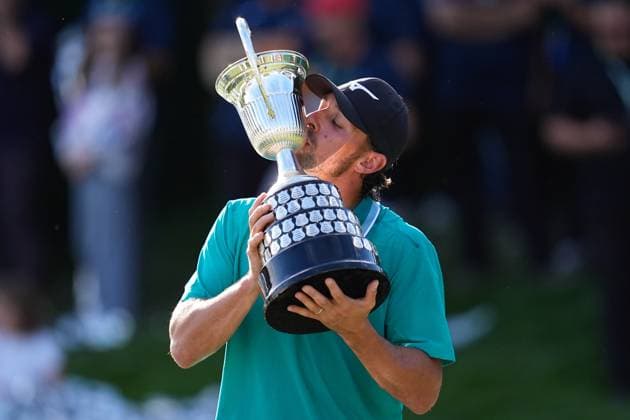 October 12, 2025, Madrid, Madrid, Spain: Marco Penge of England celebrates with the Champion Trophy during the Trophy Ceremony after the Open de EspaoÂ±a presented by Madrid, R4 Final, golf tournament of DP World Tour at Club de Campo Villa de Madrid on October 12, 2025, in Madrid, Spain. Madrid Spain - ZUMAa181 20251012_zaa_a181_341 Copyright: xDennisxAgyemanx