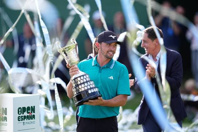 October 12, 2025, Madrid, Madrid, Spain: Marco Penge of England celebrates with the Champion Trophy during the Trophy Ceremony after the Open de EspaoÂ±a presented by Madrid, R4 Final, golf tournament of DP World Tour at Club de Campo Villa de Madrid on October 12, 2025, in Madrid, Spain. Madrid Spain - ZUMAa181 20251012_zaa_a181_343 Copyright: xDennisxAgyemanx