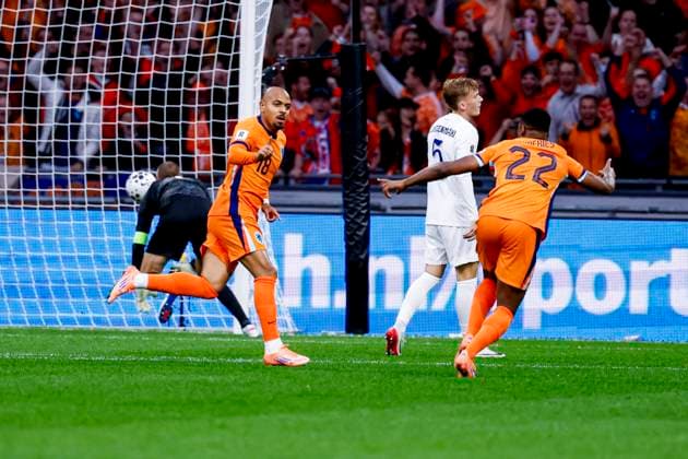 Donyell Malen of the Netherlands celebrates with teammates after scoring his teams first goal Netherlands v Finland, FIFA World Cup, WM, Weltmeisterschaft, Fussball 2026 Qualifier, Netherlands v Finland, Johan Cruijff Arena, October 12, 2025, Amsterdam, Netherlands.