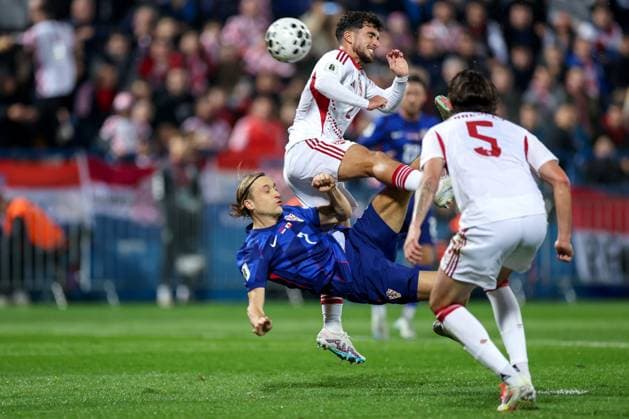 Croatia v Gibraltar - FIFA World Cup, WM, Weltmeisterschaft, Fussball 2026 Qualifier VARAZDIN, CROATIA - OCTOBER 12: Lovro Majer of Croatia and Julian Valarino of Gibraltar battles for the ball during the FIFA World Cup 2026 qualifier match between Croatia and Gibraltar at Football Stadium Varteks on October 12, 2025 in Varazdin, Croatia.  MatijaxHabljak PIXSELL