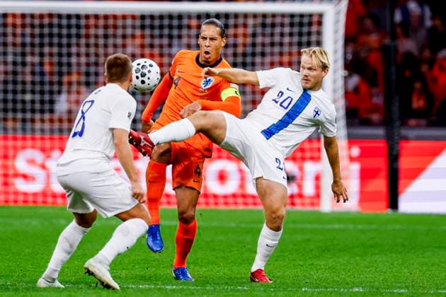 Teemu Pukki of Finland and Virgil van Dijk of the Netherlands battle for the ball Netherlands v Finland, FIFA World Cup, WM, Weltmeisterschaft, Fussball 2026 Qualifier, Netherlands v Finland, Johan Cruijff Arena, October 12, 2025, Amsterdam, Netherlands.
