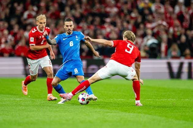 Denmark v Greece, UEFA World Cup qualifier, Copenhagen, Denmark Copenhagen, Denmark. 12th, October 2025. Dimitrios Kourbelis (6) of Greece and Rasmus Hojlund of Denmark seen during the UEFA world cup qualifier between Denmark and Greece at Parken in Copenhagen. Denmark, Copenhagen  Copyright: xGonzalesxPhoto TobiasxJorgensenx
