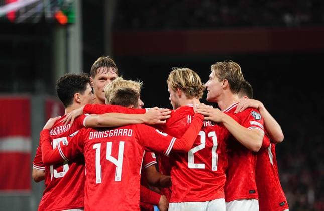 October 12 2025: Mikkel Damsgaard of Denmark scores and celebrates his teams third goal during a World Cup Qualification game, Denmark v Greece, at Parken, Copenhagen, Denmark. Kim Price CSM Copenhagen Denmark - ZUMAc04_ 20251012_zma_c04_049 Copyright: xUlrikxPedersenx