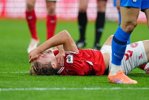 October 12 2025: Rasmus HoÂ¸jlund of Denmark on the ground during a World Cup Qualification game, Denmark v Greece, at Parken, Copenhagen, Denmark. Kim Price CSM Copenhagen Denmark - ZUMAc04_ 20251012_zma_c04_058 Copyright: xUlrikxPedersenx