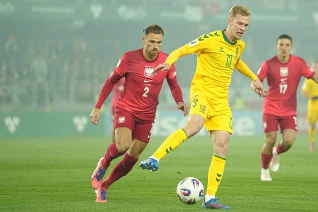 Matty Cash and Justas Lasickas seen during World Cup 2026 European Qualifying game between national teams of Lithuania and Poland (Lukasz Germaniuk Ball Raw Images) Kaunas Darius and Girenas Stadium Lithuania Copyright: xLukaszxGermaniukx lukaszgermaniuk_lithuaniapoland25_26-02