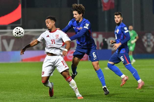 Croatia v Gibraltar - FIFA World Cup, WM, Weltmeisterschaft, Fussball 2026 Qualifier VARAZDIN, CROATIA - OCTOBER 12: Carlos Richards of Gibraltar battles for the ball with Domagoj Bradaric of Croatia during the FIFA World Cup 2026 qualifier match between Croatia and Gibraltar at Football Stadium Varteks on October 12, 2025 in Varazdin, Croatia.  VjeranxZganecxRogulja PIXSELL