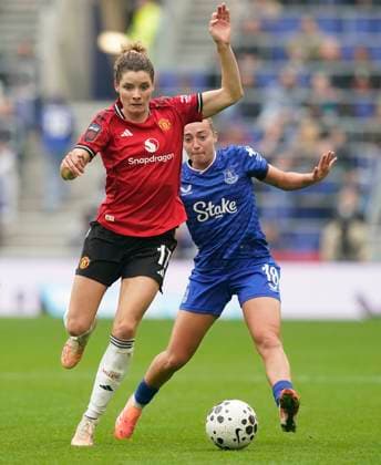 Liverpool, England, 12th October 2025. Dominique Janssen of Manchester Utd (L) is challenged by Ornella Vignola of Everton during the Everton Women vs Manchester United, ManU Women Barclays Women s Super League match at Hill Dickinson Stadium, Liverpool. Picture credit should read: Andrew Yates Sportimage EDITORIAL USE ONLY. No use with unauthorised audio, video, data, fixture lists, club league logos or live services. Online in-match use limited to 120 images, no video emulation. No use in betting, games or single club league player publications. SPI_099_AY_EVERTON_W_MAN_UTD_W SPI-4212-0099