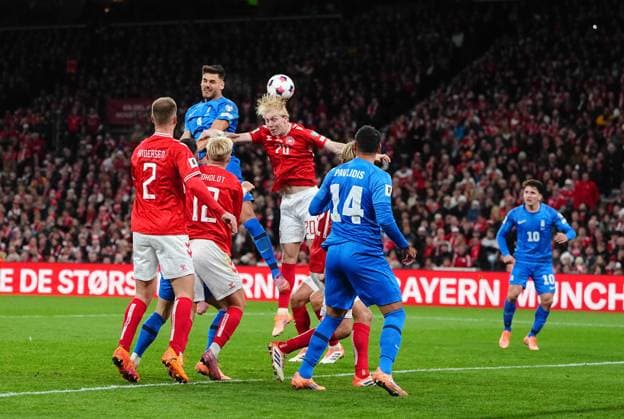 October 12 2025: Ntinos Mavropanos of Greece heads during a World Cup Qualification game, Denmark v Greece, at Parken, Copenhagen, Denmark. Kim Price CSM Copenhagen Denmark - ZUMAc04_ 20251012_zma_c04_115 Copyright: xUlrikxPedersenx