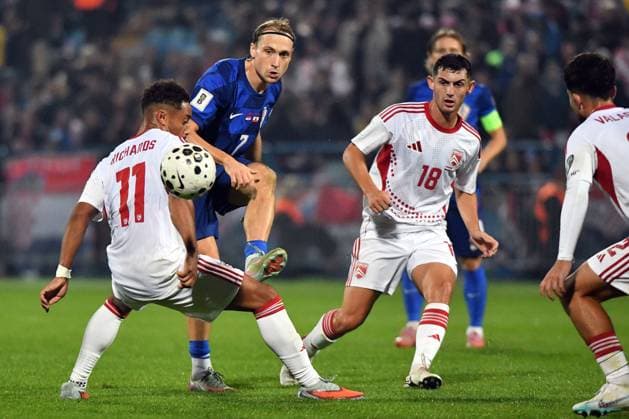 Croatia v Gibraltar - FIFA World Cup, WM, Weltmeisterschaft, Fussball 2026 Qualifier VARAZDIN, CROATIA - OCTOBER 12: Lovro Majer of Croatia pass the ball whilst under pressure from Carlos Richards and Kyle Clinton of Gibraltar during the FIFA World Cup 2026 qualifier match between Croatia and Gibraltar at Football Stadium Varteks on October 12, 2025 in Varazdin, Croatia.  VjeranxZganecxRogulja PIXSELL