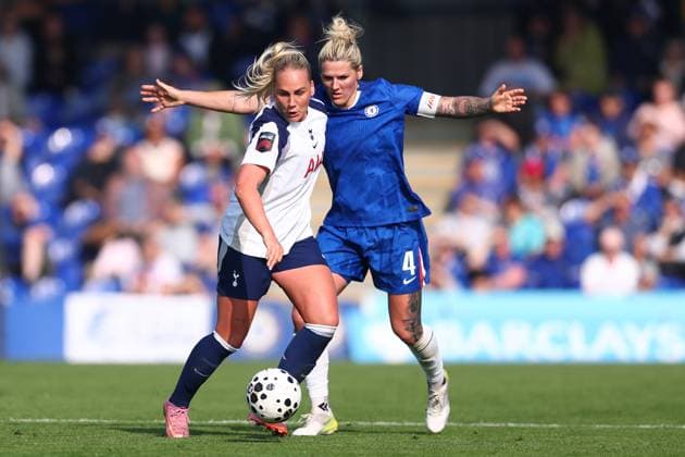 Kington Upon Thames, England, 12th October 2025. Cathinka Tandberg of Tottenham Hotspur and ˜Millie Bright of Chelsea challenge for the ball during the Chelsea Women vs Tottenham Women Barclays Women s Super League match at Kingsmeadow, Kington Upon Thames. Picture credit should read: Paul Terry Sportimage EDITORIAL USE ONLY. No use with unauthorised audio, video, data, fixture lists, club league logos or live services. Online in-match use limited to 120 images, no video emulation. No use in betting, games or single club league player publications. SPI_116_PT_Chelsea_W_Spurs_W SPI-4209-0115