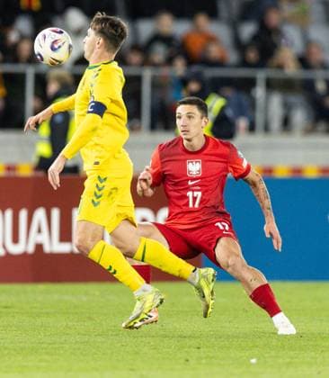 12th October 2025; Dariaus ir Gir& x117;no stadionas, Kaunas, Lithuania; FIFA World Cup, WM, Weltmeisterschaft, Fussball Qualifying Group G International Football, Lithuania versus Poland; Fedor Cernych (LTU) controls the ball from Bartosz Slisz (POL)  FotoxOlimpik