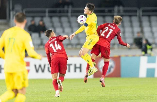 12th October 2025; Dariaus ir Gir& x117;no stadionas, Kaunas, Lithuania; FIFA World Cup, WM, Weltmeisterschaft, Fussball Qualifying Group G International Football, Lithuania versus Poland; Jakub Kiwior (POL), Fedor Cernych (LTU) collides with Michal Skoras (POL)  FotoxOlimpik