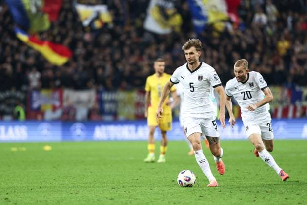SOCCER - FIFA WC quali, ROU vs AUT BUCHAREST,ROMANIA,12.OCT.25 - SOCCER - FIFA World Cup, WM, Weltmeisterschaft, Fussball 2026, European Qualifiers, group stage, OEFB international match, Länderspiel, Nationalmannschaft Romania vs Austria. Image shows Stefan Posch and Konrad Laimer (AUT). GEPAxpictures xArminxRauthner