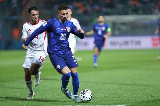 VaraÅ¾din, 12.10.2025. - UEFA, Croatia - Gibraltar 3:0, Qualifying round, Football Stadium Varteks - VaraÅ¾din, Group L . Franjo Ivanovic (20) vs Kian Ronan (14) Croatia - Gibraltar 3:0 