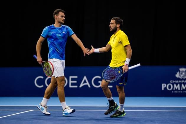 Polish Piotr Matuszewski and Bosnian Damir Dzumhur pictured in action during the European Open ATP, Tennis Herren tennis tournament in Brussels, on Monday 13 October 2025. This year s edition of the tournament is taking place from 12 to 19 October 2025. JASPERxJACOBS  x136688140x