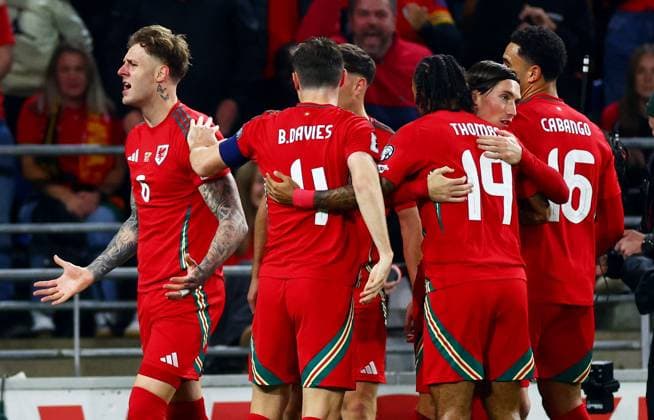 Joe Rodon of Wales celebrates scoring a goal after making the score 1-0. Wales v Belgium, FIFA 2026 World Cup Qualifying, Group J, Football, Cardiff City Stadium, Cardiff, Wales, UK - 13 Oct 2025Cardiff Cardiff City Stadium Wales United Kingdom EDITORIAL USE ONLY No use with unauthorised audio, video, data, fixture lists, club league logos or live services. Online in-match use limited to 120 images, no video emulation. No use in betting, games or single club league player publications. Copyright: xJamesxMarsh Shutterstockx 15523219ao