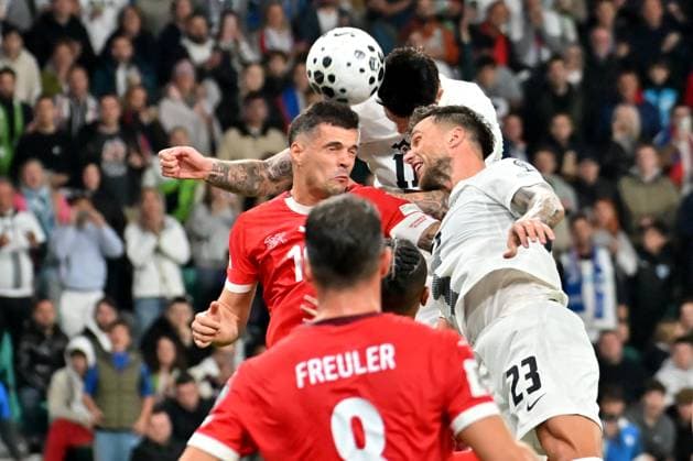 Ljubljana, Slovenia, October 13th 2025, Benjamin Sesko of Slovenia (C) in action against Granit Xhaka of Switzerland (L) during the UEFA European Qualifiers for 2026 World Cup, Group B match between Slovenia and Switzerland at Stadium Stozice, Ljubljana, Slovenia. (Photo by Igor Kupljenik Sports Press Photo) Copyright: xIgorxKupljenikx xSPPx Sportspressphoto_SPR42171