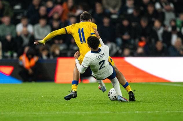 13th October 2025; Pride Park, Derby, Midlands, England; UEFA European Under 21 Championship Qualifying, England versus Andorra; Rico Lewis of England U21, U 21 tussles with Nil Boutarfas of Andorra U21  GodfreyxPitt