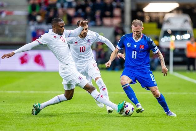 SLOVAKIA - LUXEMBOURG Ondrej Duda of Slovakia and Christopher Martins, Danel Sinani of Luxembourg during European qualifier of World Cup 2026 football match between Slovakia and Luxembourg. City Arena, Trnava, Slovakia, October 13, 2025. Copyright: xx 080A1332