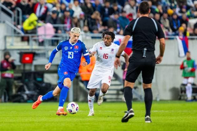SLOVAKIA - LUXEMBOURG Tomas Rigo of Slovakia and Leandro Barreiro of Luxembourg during European qualifier of World Cup 2026 football match between Slovakia and Luxembourg. City Arena, Trnava, Slovakia, October 13, 2025. Copyright: xx 080A1565