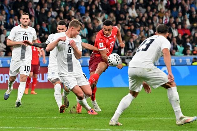 Ljubljana, Slovenia, October 13th 2025, Dan Ndoye of Switzerland (C) in action against Jaka Bijol of Slovenia (L) during the UEFA European Qualifiers for 2026 World Cup, Group B match between Slovenia and Switzerland at Stadium Stozice, Ljubljana, Slovenia. (Photo by Igor Kupljenik Sports Press Photo) Copyright: xIgorxKupljenikx xSPPx Sportspressphoto_SPR42191