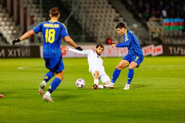 Abdulakh Khaybulaev and Ruslan Malinovskyi seen during World Cup 2026 European qualification game between national teams of Ukraine and Azerbaijan (Ernest Kolodziej Ball Raw Images) Cracow Cracovia Stadium Poland Copyright: xErnestxKolodziejx ernestkolodziej_ukraine_azarbaijan_pt2_2526-078