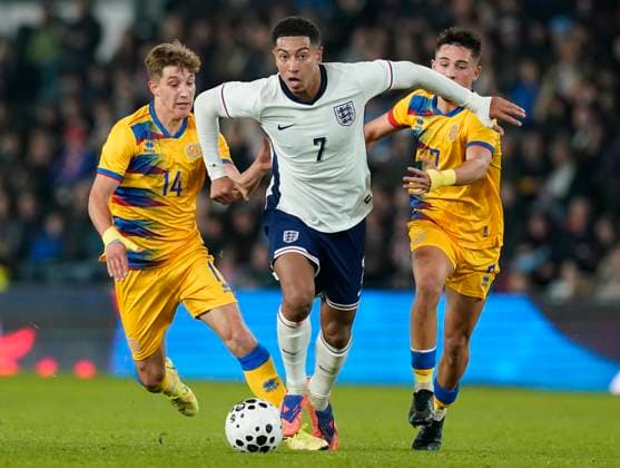 Derby, England, 13th October 2025. Jobe Bellingham of England (C) is challenged by Jan Guma of Andorra (R) and Ivan Dominguez of Andorra during the England U21, U 21 vs Andorra U21 UEFA European Under-21 Championship Qualifier match at Pride Park Stadium, Derby. Picture credit should read: Andrew Yates Sportimage EDITORIAL USE ONLY. No use with unauthorised audio, video, data, fixture lists, club league logos or live services. Online in-match use limited to 120 images, no video emulation. No use in betting, games or single club league player publications. SPI_101_AY_ENGu21_ANDORRAu21 SPI-4215-0100