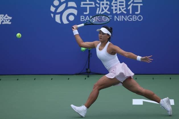 NINGBO, CHINA - OCTOBER 14: Guo Hanyu of China competes in the Women s Singles Round of 32 match against Liudmila Samsonova on day 2 of 2025 Ningbo Open at the Ningbo (Yinzhou) Tennis Center on October 14, 2025 in Ningbo, Zhejiang Province of China.  Copyright: xVCGx 111597131196