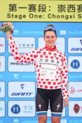 (251014) -- SHANGHAI, Oct. 14, 2025 -- Anne Knijnenburg of Volkerwessels Cycling Team celebrates in the polka-dot jersey after Stage 1 of the UCI Women s WorldTour Tour of Chongming Island Road cycling, Rad, Radsport, Strasse race in Shanghai, east China, Oct. 14, 2025. ) (SP)CHINA-SHANGHAI-CYCLING-UCI WOMEN S WORLDTOUR-TOUR OF CHONGMING ISLAND (CN) WangxXiang 