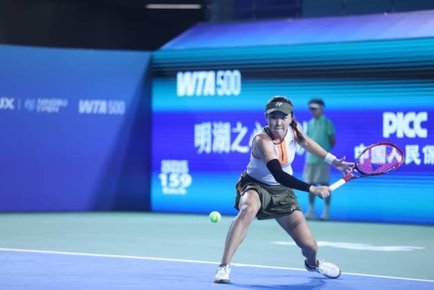 NINGBO, CHINA - OCTOBER 14: Zhu Lin of China competes in the Women s Singles Round of 32 match against Emma Raducanu of Great Britain on day 2 of 2025 Ningbo Open at the Ningbo (Yinzhou) Tennis Center on October 14, 2025 in Ningbo, Zhejiang Province of China.  Copyright: xVCGx 111597161893