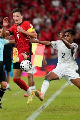 AFC Asian Cup Qualifiers: Hong Kong vs Bangladesh (L) Matthew Elliot Wing Kai Chin Orr (Matt Or) and (R) MD Shakil Topu during the AFC Asian Cup Qualifiers between Hong Kong and Bangladesh at Kai Tak Stadium on October 14, 2025 in Hong Kong. (Photo by Ellan Mad Nexpher Images)