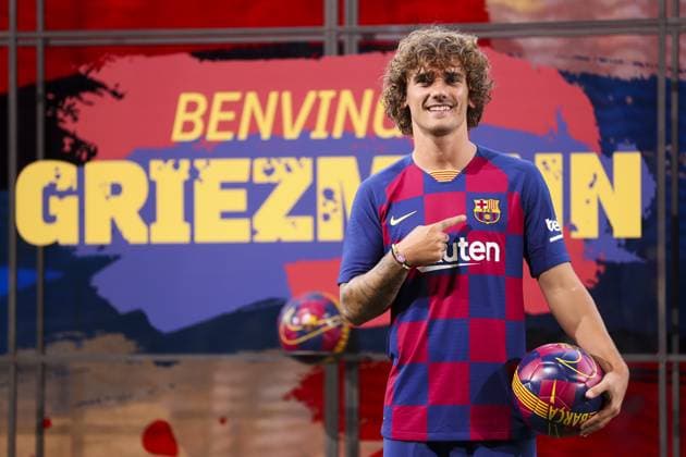 Barcelona sign French star Griezmann BARCELONA, SPAIN - JULY 14: Barcelona s new sign French star Antoine Griezmann wearing Barcelona s traditional home jersey poses for a photo during his presentation ceremony at the Camp Nou Stadium in Barcelona, Spain on July 14, 2019. Barcelona has paid the Ä120 million ($134.9 million) buyout clause to release Antoine Griezmann from Atletico Madrid, Barcelona said on its website. Spain World. Editorial use only. Please get in touch for any other usage.  Copyright: x2025xAnadoluxAdriaxPuigx