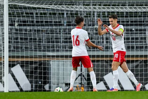 251014 Tomasz Pienko of Poland celebrate with Kacper Urbanski after 0 1 during the UEFA Under 21 Qualifier football match between Sweden and Poland on October 14, 2025 in Jönköping Photo Carl Sandin BILDBYRAN kod CS CS0792 fotboll football soccer fotball em kval kval uefa european under 21 qualifier qualifier u21 under 21 sverige sweden poland bbeng jubel  Copyright: CARLxSANDIN BB251014CS008